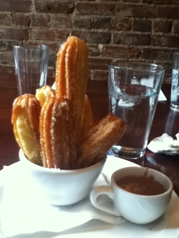 Tacos Tequila Whiskey churros with chocolate dipping sauce